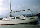 Waves breaking over Alderney Harbour wall, taken from Mehitabel 2.  We got in just in time, heavily reefed. Forecast said Force 11. September 1976.